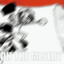 a blurred image of a hockey player with the words oh the misery written in white