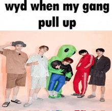 a group of people standing next to each other with the words wyd when my gang pull up on the bottom