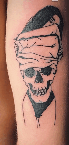 a black and white tattoo of a woman covering a skull 's eyes