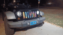 a jeep with a license plate that says rays