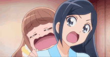 a cartoon girl with blue hair is holding another girl