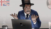 a man in a top hat looks at a laptop