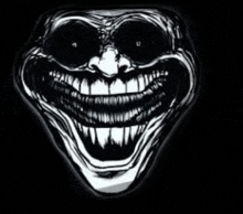 a black and white drawing of a creepy troll face with big teeth and glowing eyes .