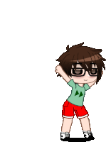 a boy with brown hair and glasses is wearing a green shirt and red shorts ..