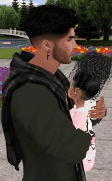 a man with a cross tattoo on his ear is holding a little girl