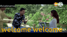 a man and a woman are standing in front of a car with the words welcome welcome written on the bottom