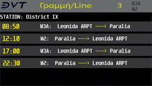 a screen displays the time and location of a station