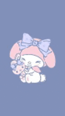 a cartoon character with a bow on her head is holding a teddy bear .