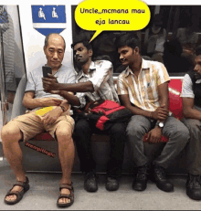 a group of men sitting on a train with a yellow speech bubble that says uncle mcmana mau eja lancau