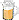 a close up of a glass of beer on a table with a white background .