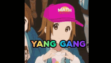 a girl wearing a pink hat with the word math on it .