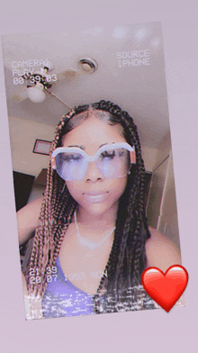 a picture of a girl with braids and sunglasses with the words source iphone on the bottom