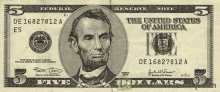 a five dollar bill with a picture of abraham lincoln on it