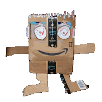 a cardboard box with a face made out of it and the word prime on it