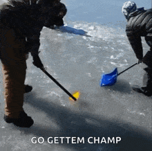 two men are playing ice hockey on a frozen lake and one of them is holding a hockey stick .