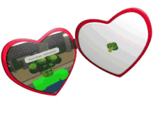 a heart shaped mirror with a broccoli sticker on it