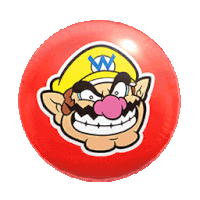 a red ball with a sticker of wario on it