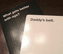 a card that says " daddy 's belt " on it