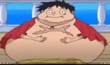 a very fat monkey d luffy from one piece is sitting on a wooden deck .