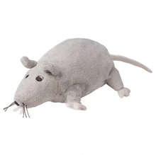 a stuffed gray mouse with black eyes and a long tail