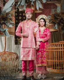 a bride and groom pose for a photo by dieka rachir