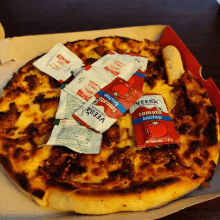 a pizza with tomato ketchup and veeba tomato ketchup