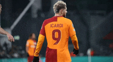 a soccer player with the number 9 on his back