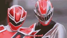 two red power rangers are standing next to each other with the words just who are you written below them