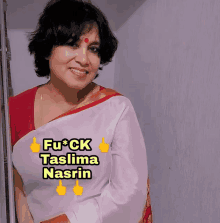 a woman wearing a red top and a white shirt with the words fu * ck taslima nasrin above her