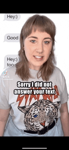 a woman wearing a shirt that says sorry i did not answer your text on it