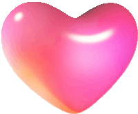 a pink heart is floating in the air