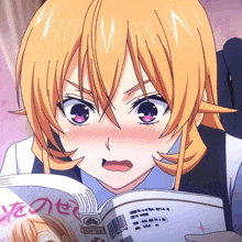 a girl with blonde hair is reading a book with a surprised look on her face .