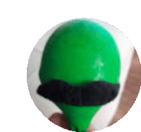 a person is holding a green balloon with a mustache on it