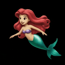 a mermaid with red hair and a green tail is flying in the air