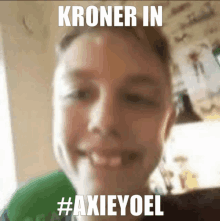 a picture of a boy with the words kroner in #axieyoel