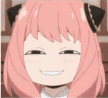 a close up of a pink haired anime girl smiling with a cat ear .