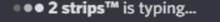 a blurred image of the words " 2 strips is typing "