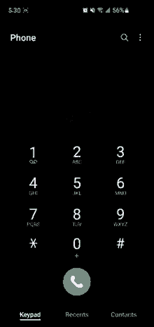 a phone screen shows a phone number with a asterisk on it