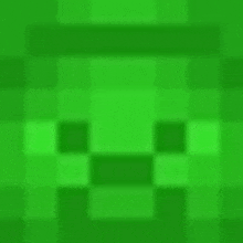 a close up of a green pixelated face with a hat .