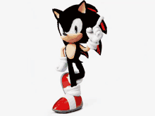 a black and white sonic the hedgehog with red shoes