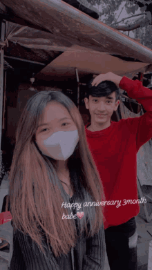 a girl wearing a mask stands next to a boy with the words happy anniversary 3 month babe written on the bottom