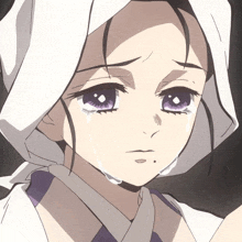 a girl with purple eyes and a white head scarf on her head is crying