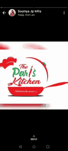 a logo for the paris kitchen with a frying pan