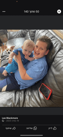 a boy is holding a baby on a couch in a facebook post