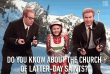 a group of men are standing next to a woman in a ski suit and asking her about the church of latter-day saints