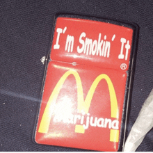 a mcdonald 's lighter that says i 'm smokin ' it marijuana