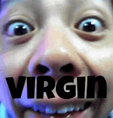 a close up of a person 's face with the word virgin on it