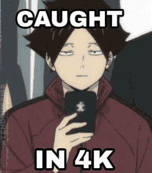 a meme of a person holding a cell phone with the words caught in 4k