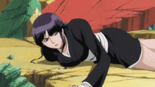 a female anime character laying on the ground