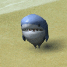 a cartoon shark with a blue head is walking on a sandy beach